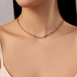 model wearing gold waterproof stainless steel link necklace