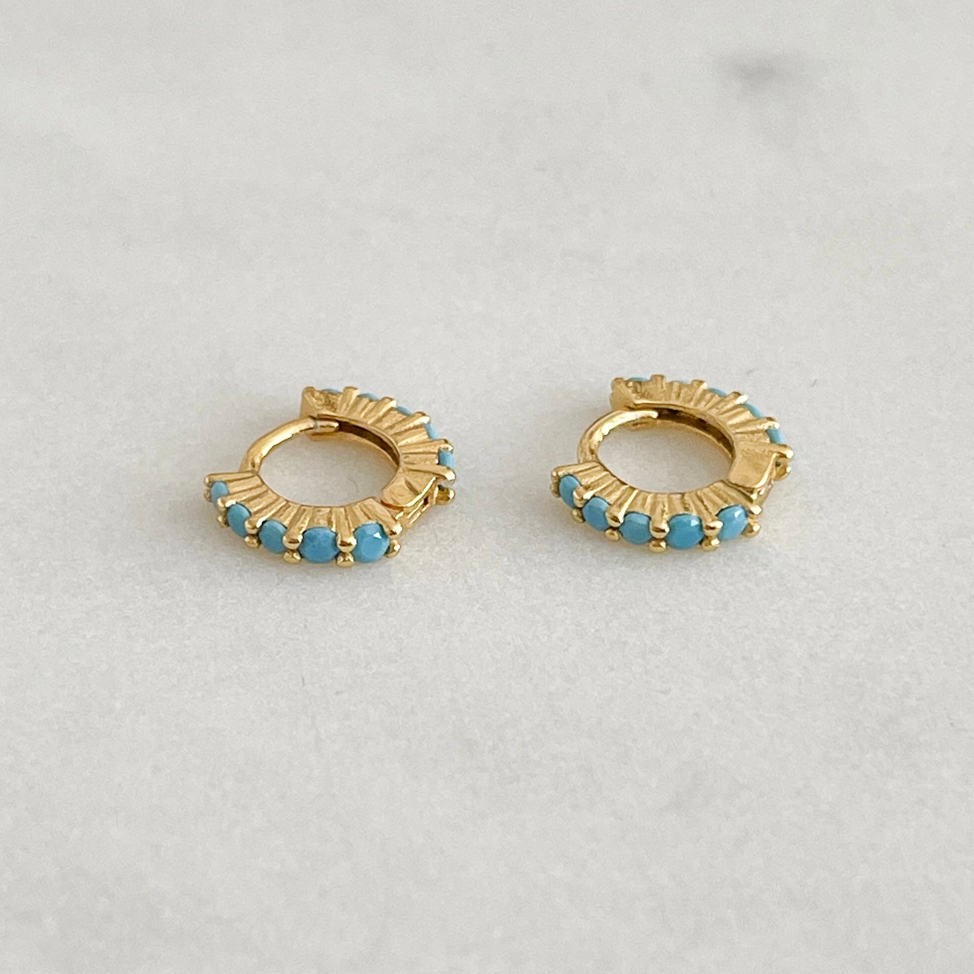 
blue stone earrings | huggie earrings | small earrings | womens jewellery | waterproof jewellery | trending jewellery | jewellery under £40 | jewellery for gifts | gold jewellery | silver jewellery | stainless steel jewellery