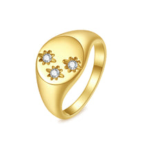 gold stainless steel waterproof ring with three clear stones, sparkle
