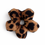 Small Leopard print flower shaped scrunchie on a white background