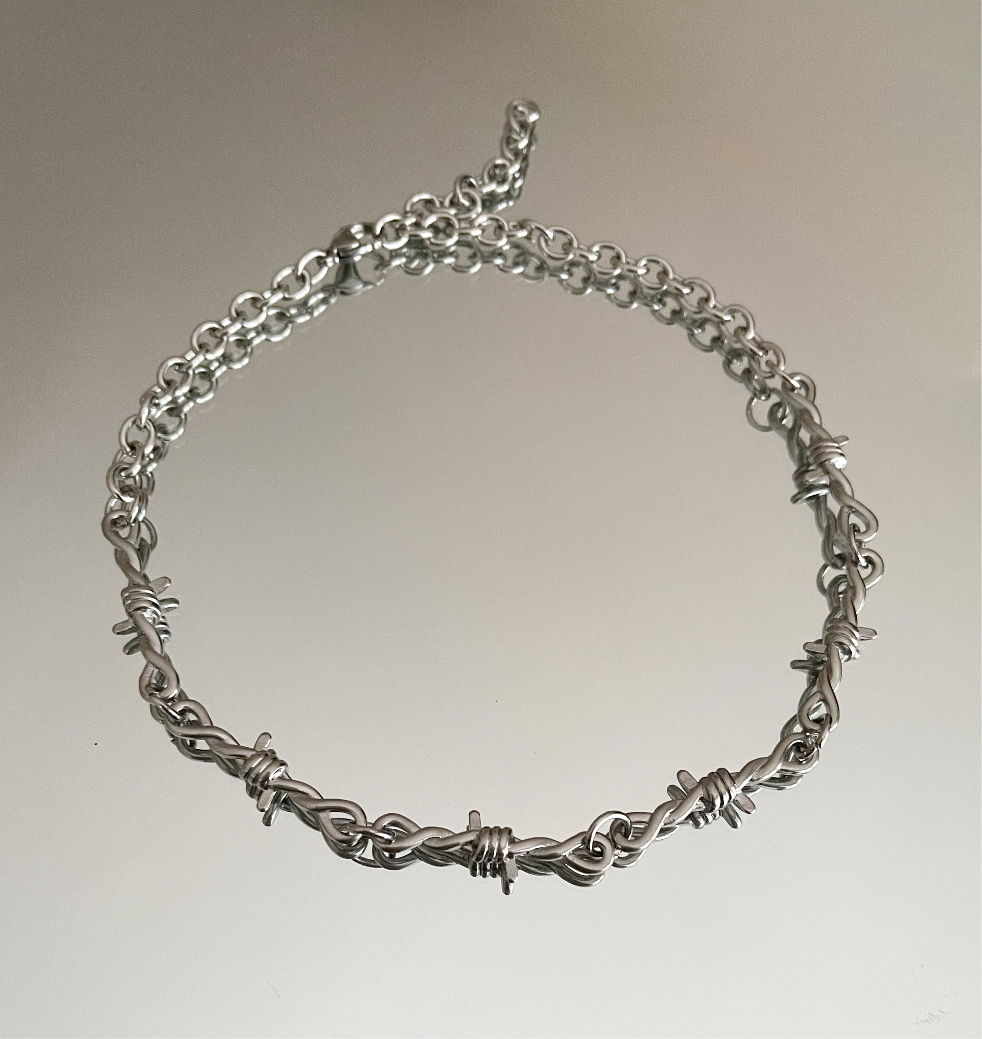 Silver Barbed Wire Necklace Available Tonight | Instagram