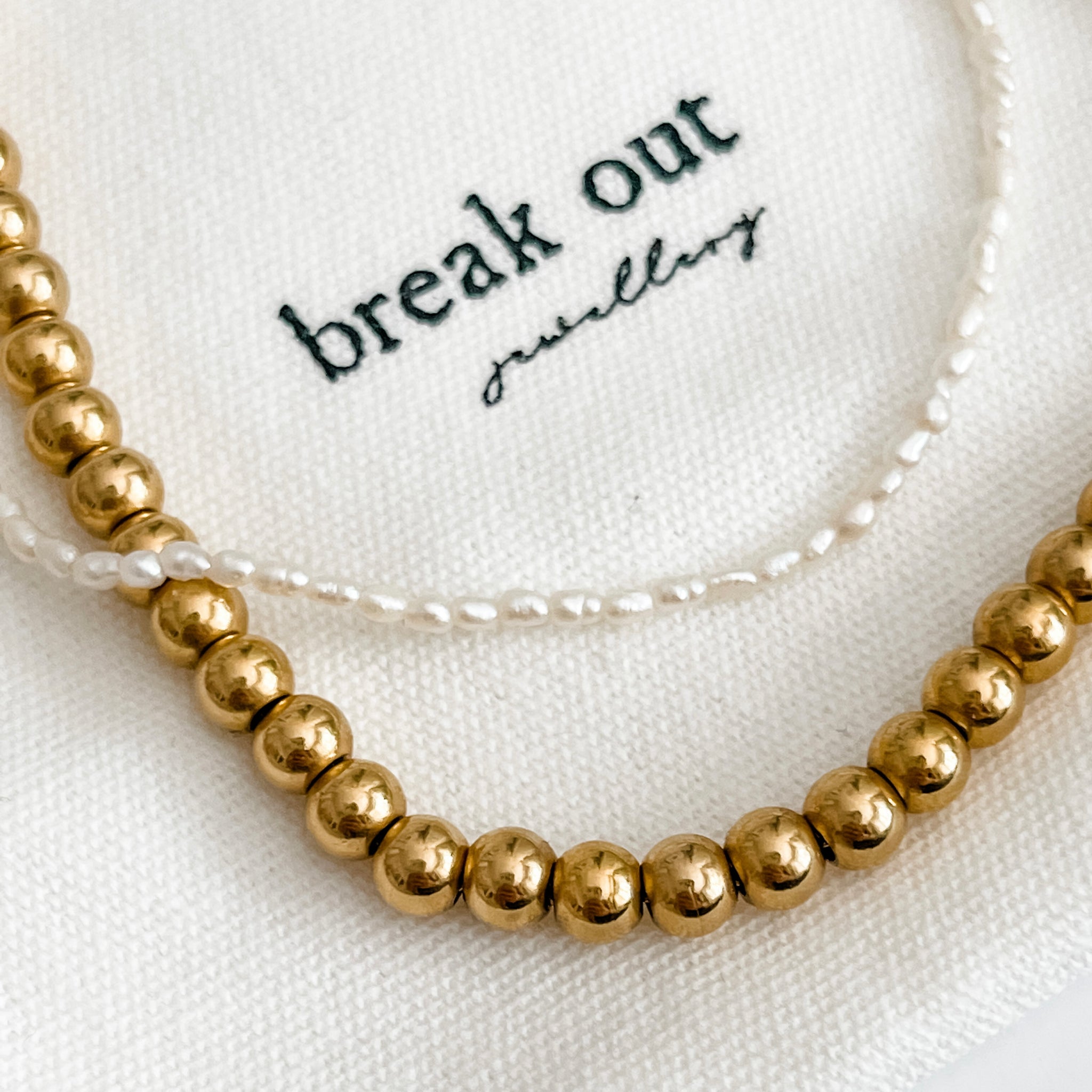 Chunky gold ball on sale necklace